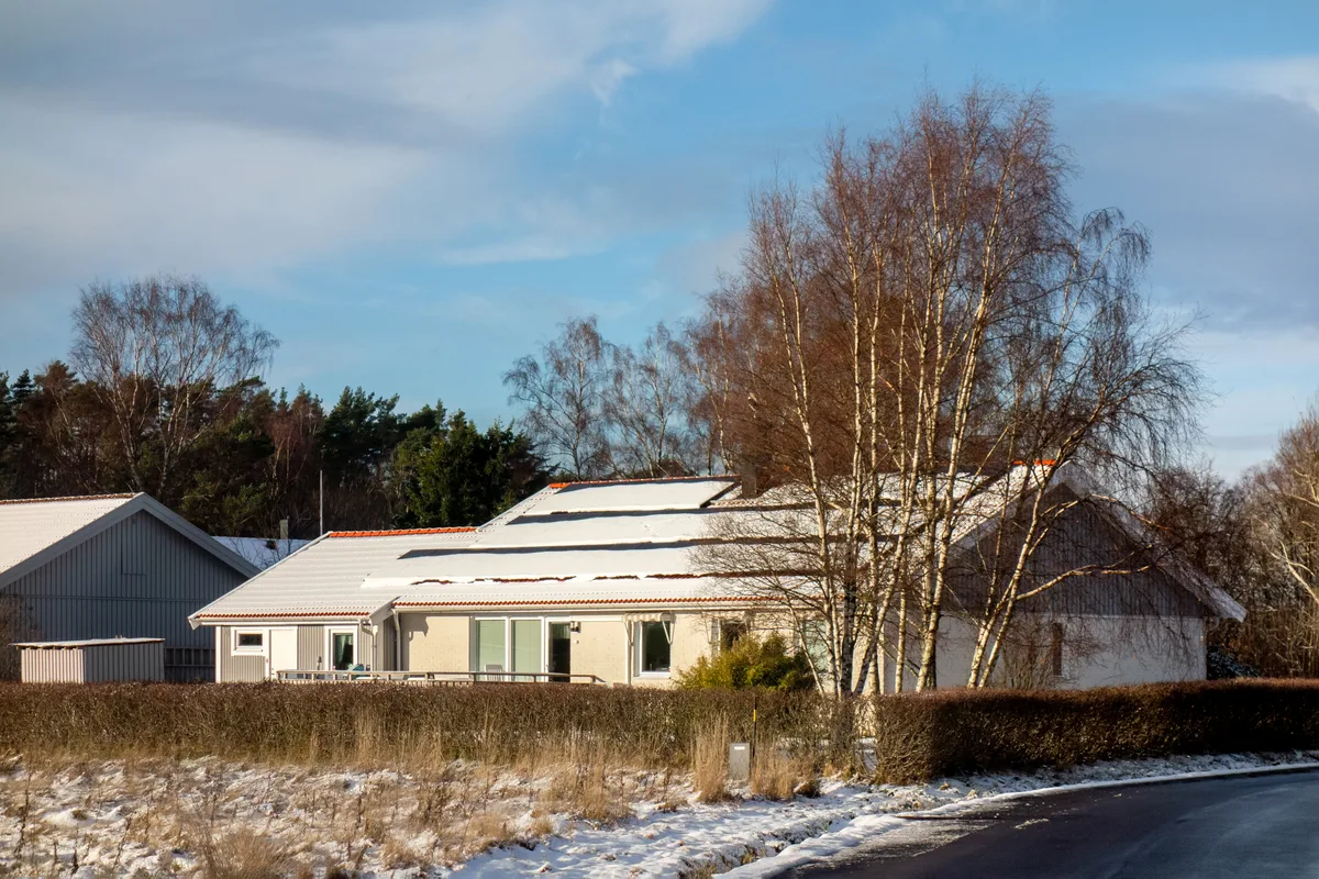 Snow on rooftop solar panels in Tuntorp, Sweden Snow covering rooftop solar panels at a home in Tuntorp, Sweden