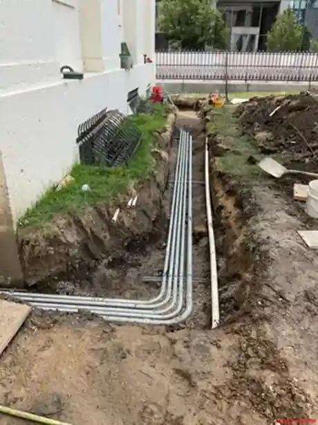 Trench excavation to run underground electrical conduit to a detached building